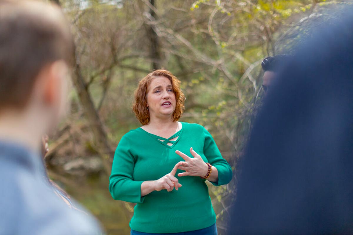 Heather Boyd speaking to supporters at an outside gathering